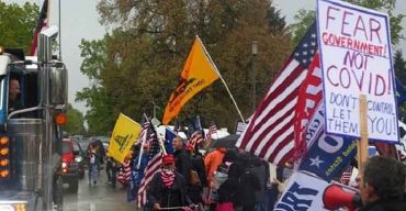 লকডাউন প্রত্যাহারের দাবিতে ওয়াশিংটনে বিক্ষোভ